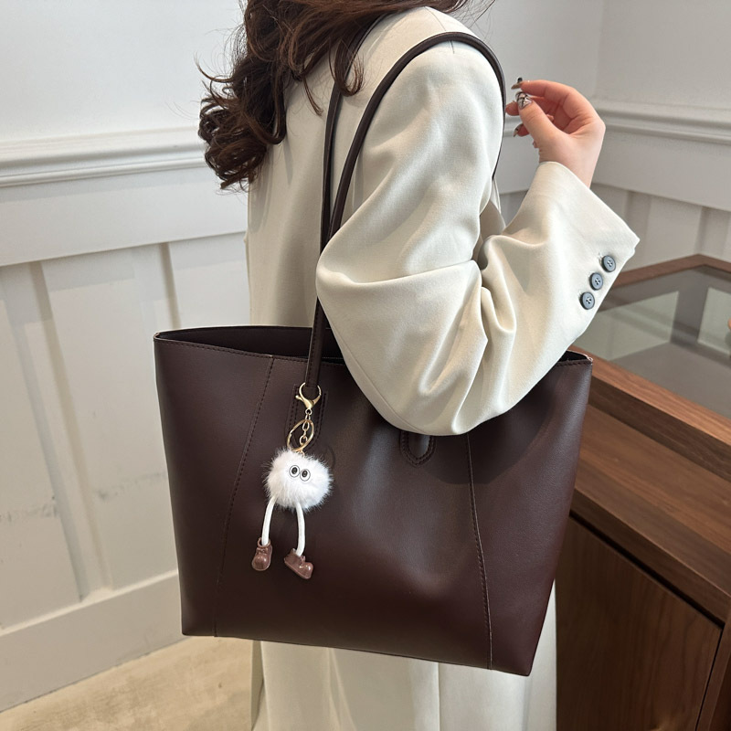 Bolsa de mano de textura de viaje casual otoño / invierno 2024 nuevo estilo coreano simple bolso de hombro axilar temperamento bolso especial