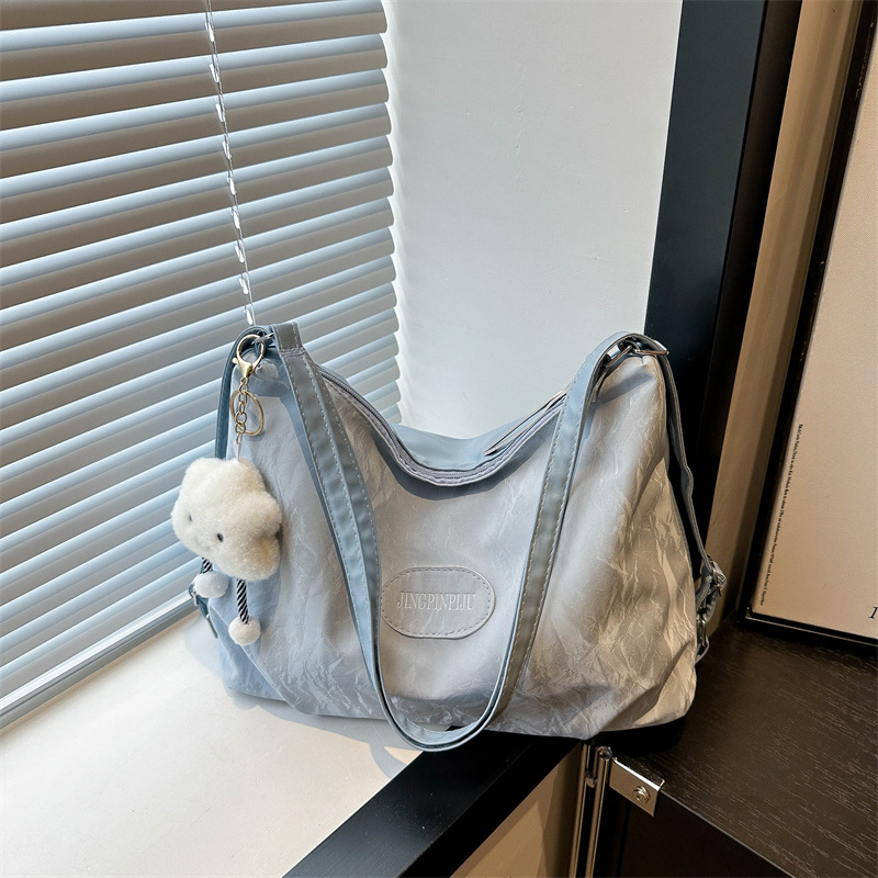 Bolsa de sensación relajada, bolsa de mujer, gran capacidad de verano, 2024, nueva bolsa de viaje de hombro de un solo tipo