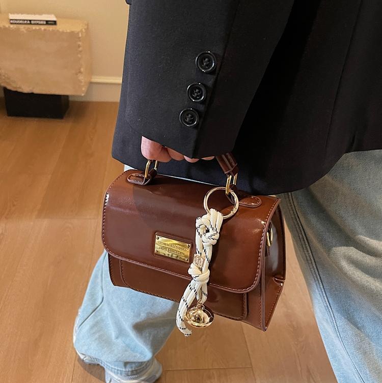 Simple y popular bolso de mano 2025 nuevo estilo de moda retro bolso de hombro coreano alta sensación mochila de mujer