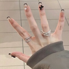 黒い蝶結びの純粋な手作りは甲の甘いクールな風を着ています。