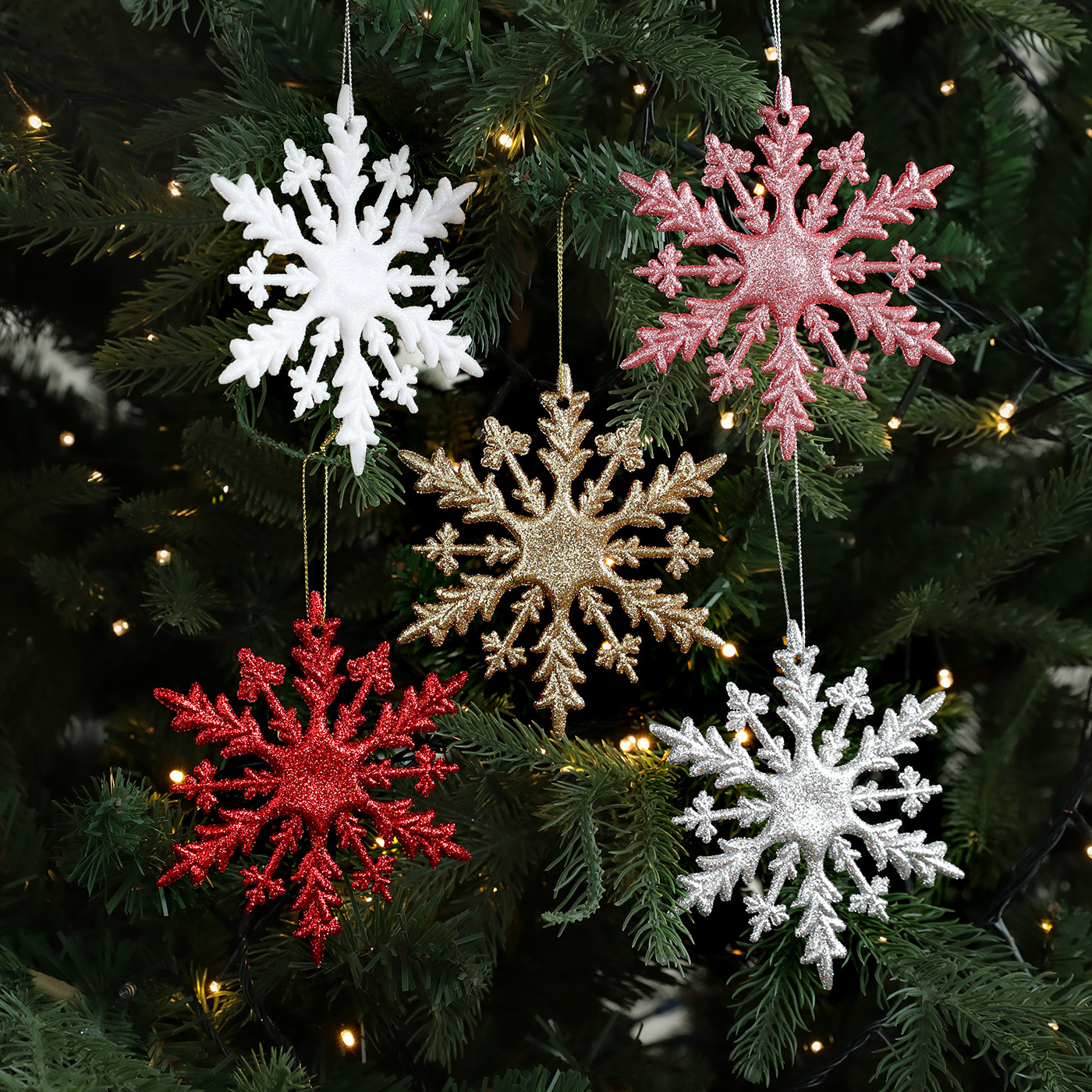 Nuevo transfronterizo 11CM plástico adhesivo flocos de nieve colgante caja de árbol de Navidad accesorios de decoración accesorios de color