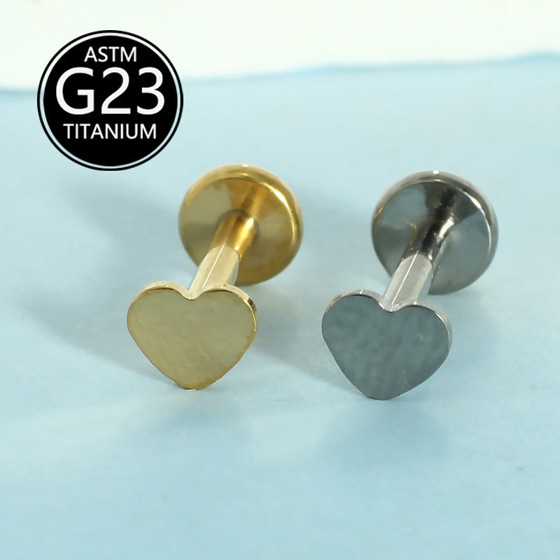 Silver pointed spike labret stud material detail