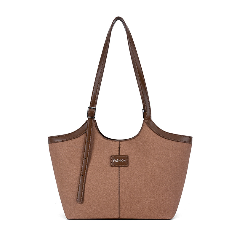 Bolsa de mano retrógrada de nicho para mujeres 2026 comercio exterior nuevo color de choque de alta calidad bolso de hombro de gran capacidad
