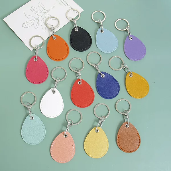 Factory Can Customize Logo Water Drop-Shaped Access Card Holder Pu Leather Elevator Card Protective Cover Nfc Card Holder Keychain