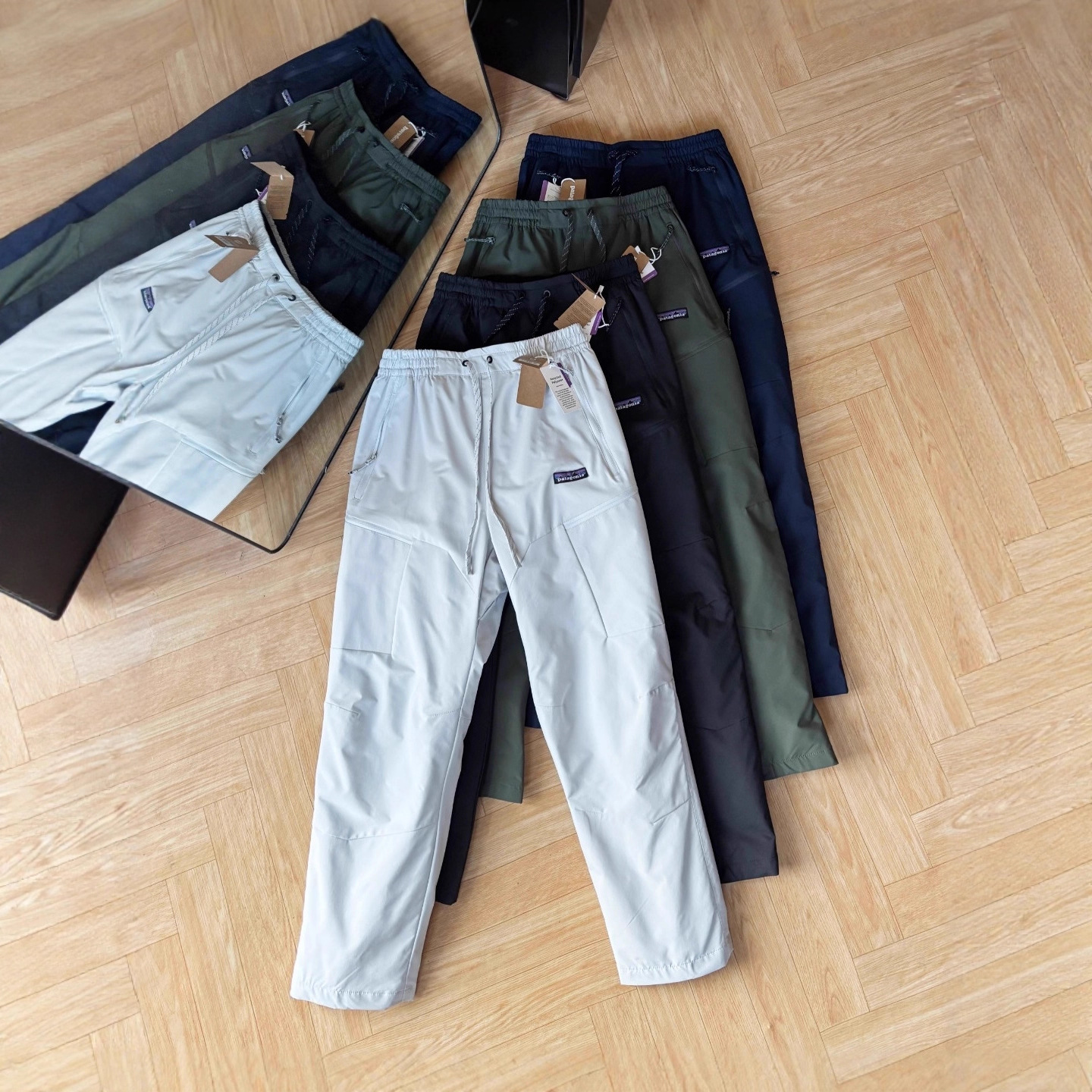 PATA directly supplies cross-border e-commerce foreign trade outdoor all-weather four-color outdoor down-filled windproof pants for couples.