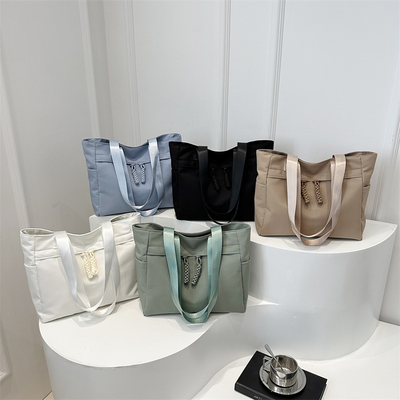 Bolsa japonesa para mujeres de gran capacidad de invierno 2024 nueva moda simple nicho bolso de hombro bolso de mano