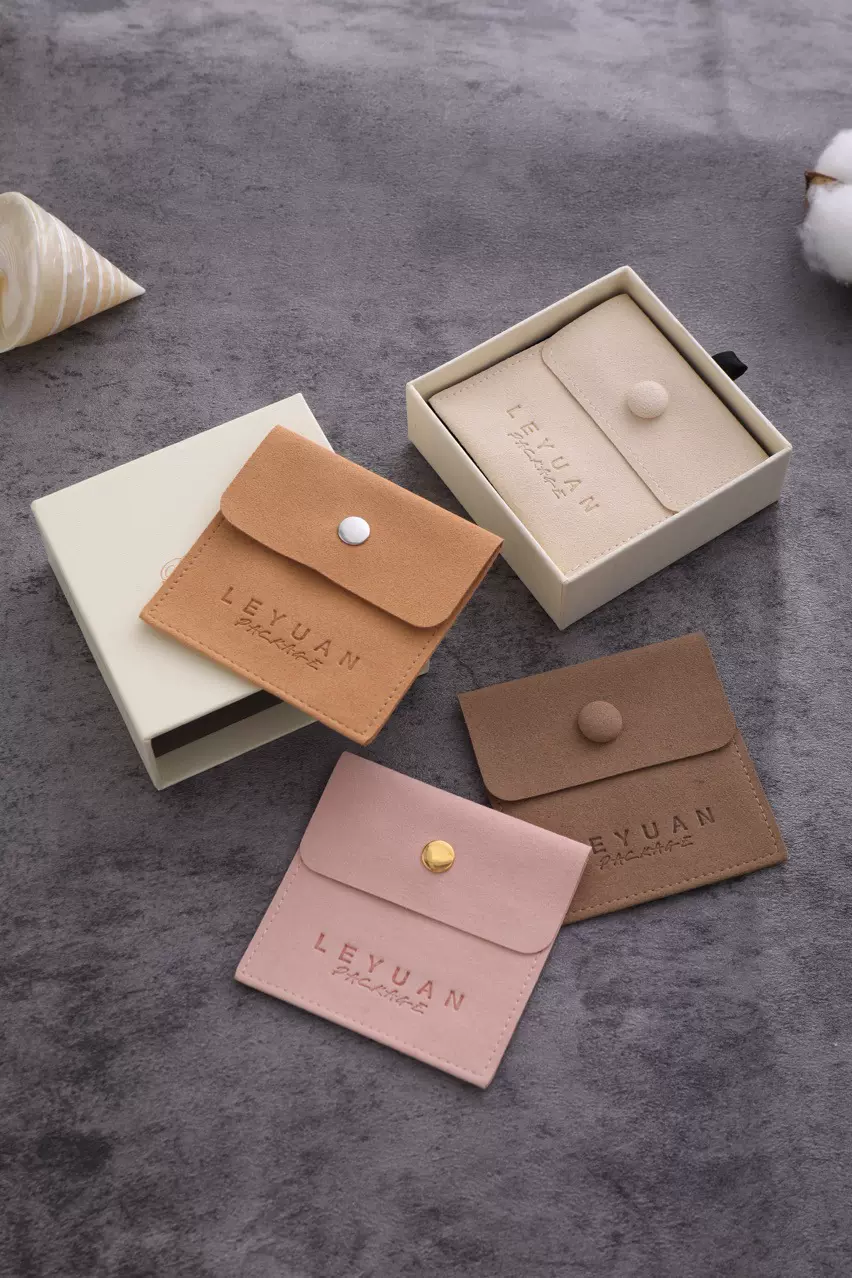 源头厂家批发超纤翻盖袋珠宝首饰包装袋金属按扣袋支持免费拿样