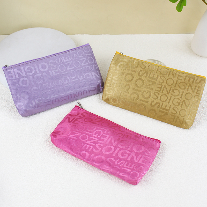 Korean Style Casual Bag Letter Jacquard Cosmetic Bag Horizontal Square Hand-held Cosmetic Bag Women's Wash Bag
