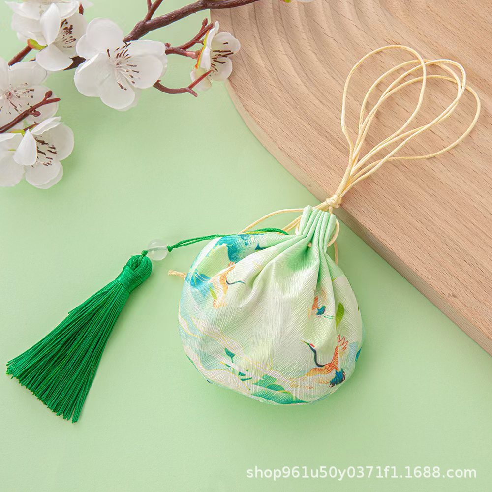 Light green-color printed sachet (with tassel)
