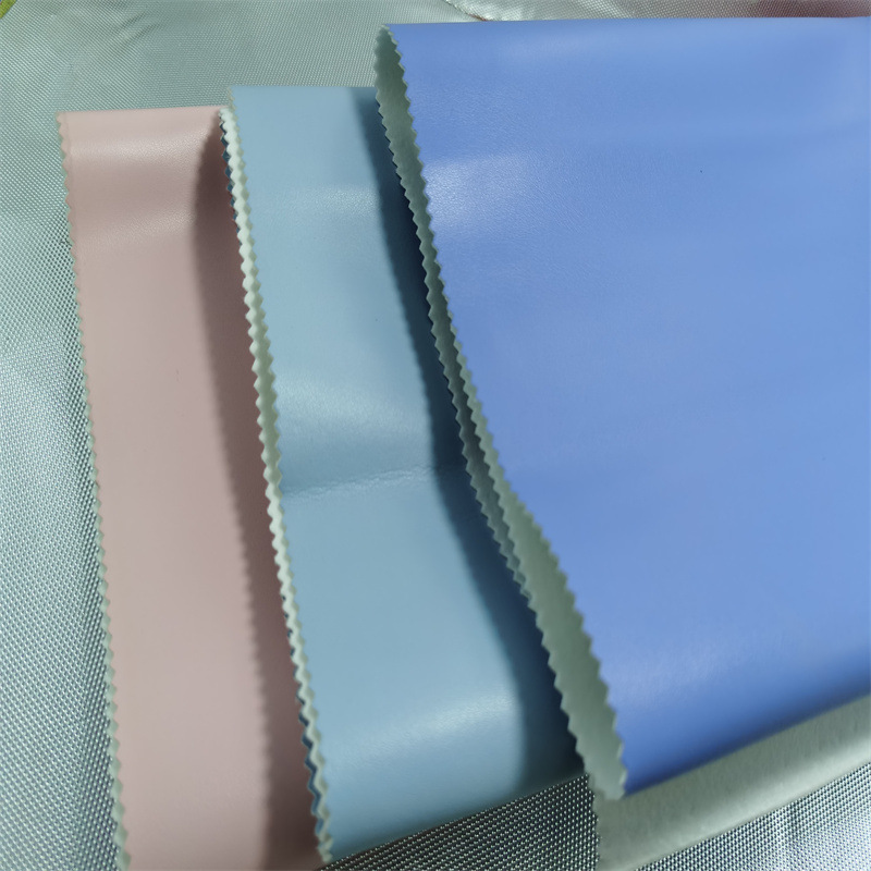 933纹1.2PU滑爽小棉袄软皮细纹环保箱包可压折打孔贴膜加工工艺面