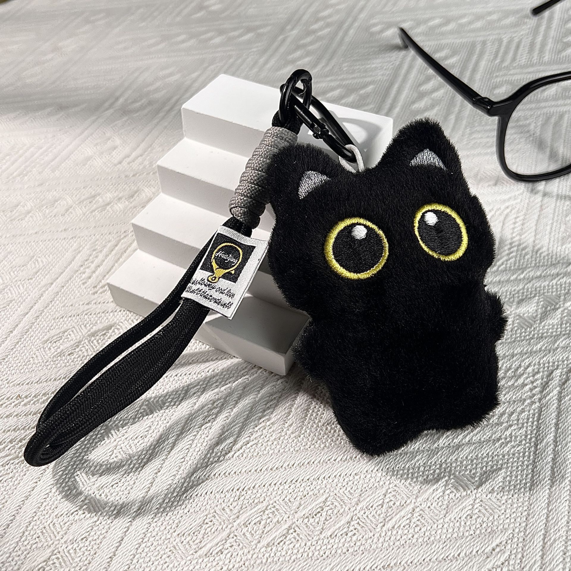 Muñecas chirriantes juguetes para niños accesorios de peluche colgantes llaveros de automóviles muñecas gatos al por mayor