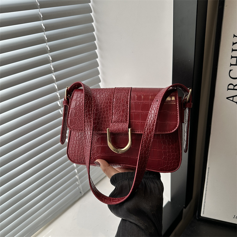Bolso para mujeres 2025, nuevo estilo de estilo extranjero, cocodrilo, bolso de mano elegante, bolso de hombro debajo de la axila.