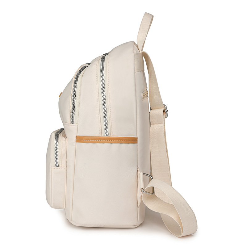 2024 nueva mochila de nylon para mujer, bolso de tela de todo fósforo de estilo coreano de moda, mochila pequeña para madre de viaje de ocio ligero