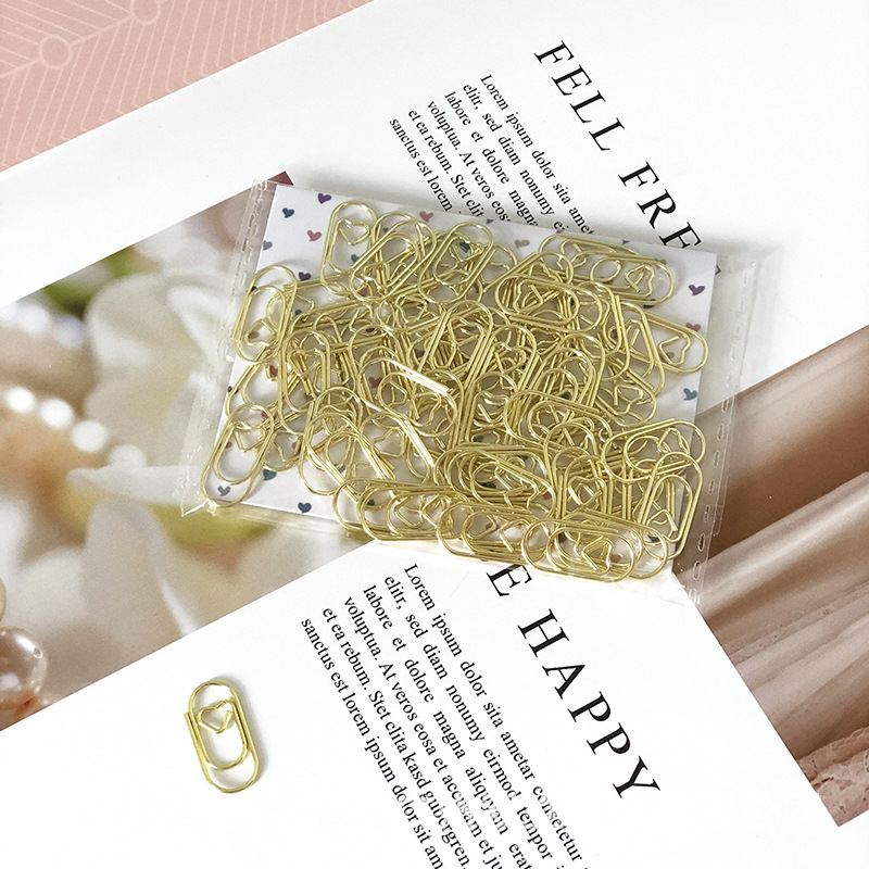 Clip de papel en forma de corazón creativo al por mayor Mini amor clip de papel de metal PP en caja fabricante de Fuente de Suministro directo transfronterizo