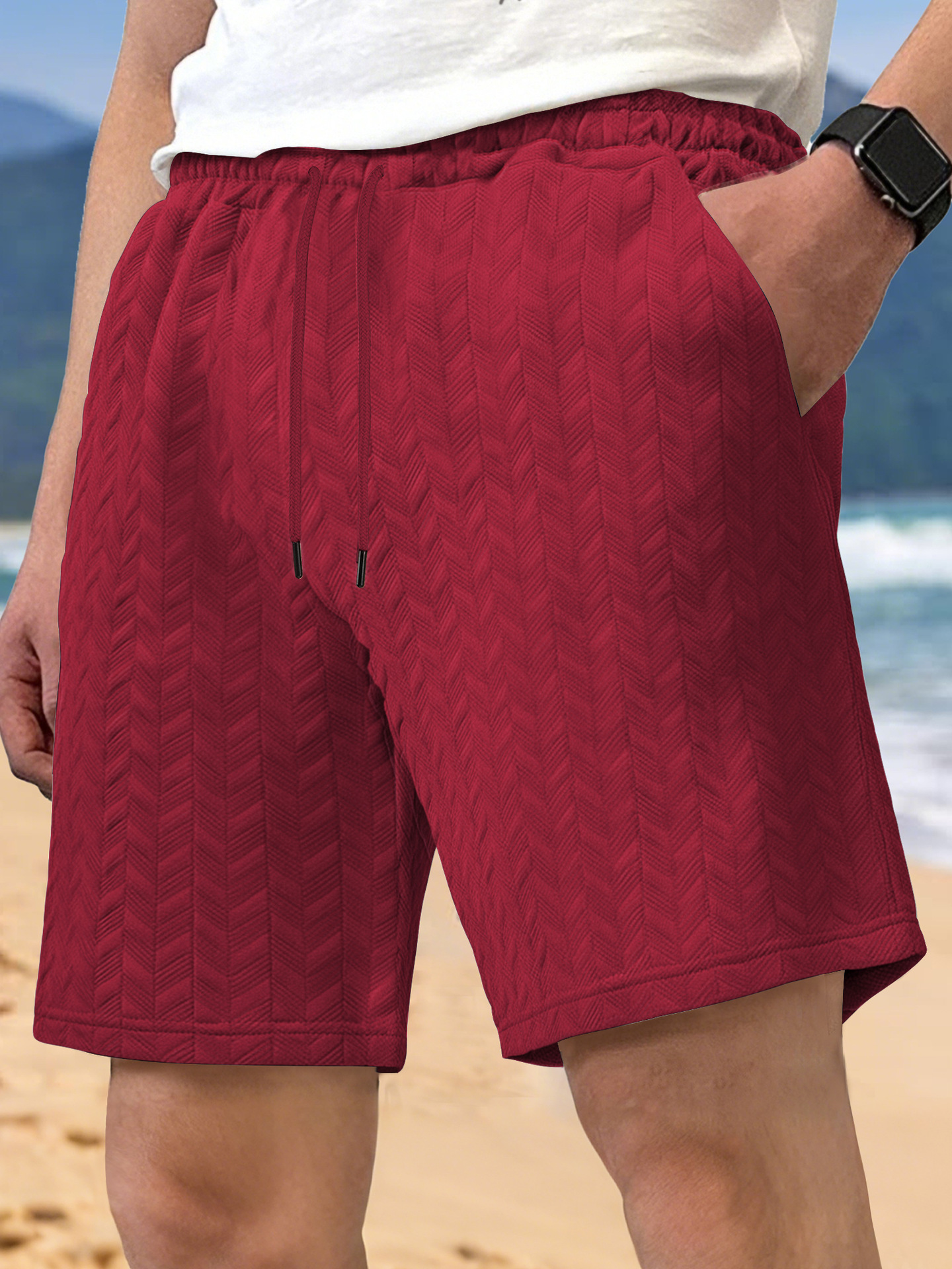 Europa y Estados Unidos ropa de hombre transfronteriza spot verano suelta pantalones cortos de color sólido jacquard correa de hombre casual pantalones cortos de playa