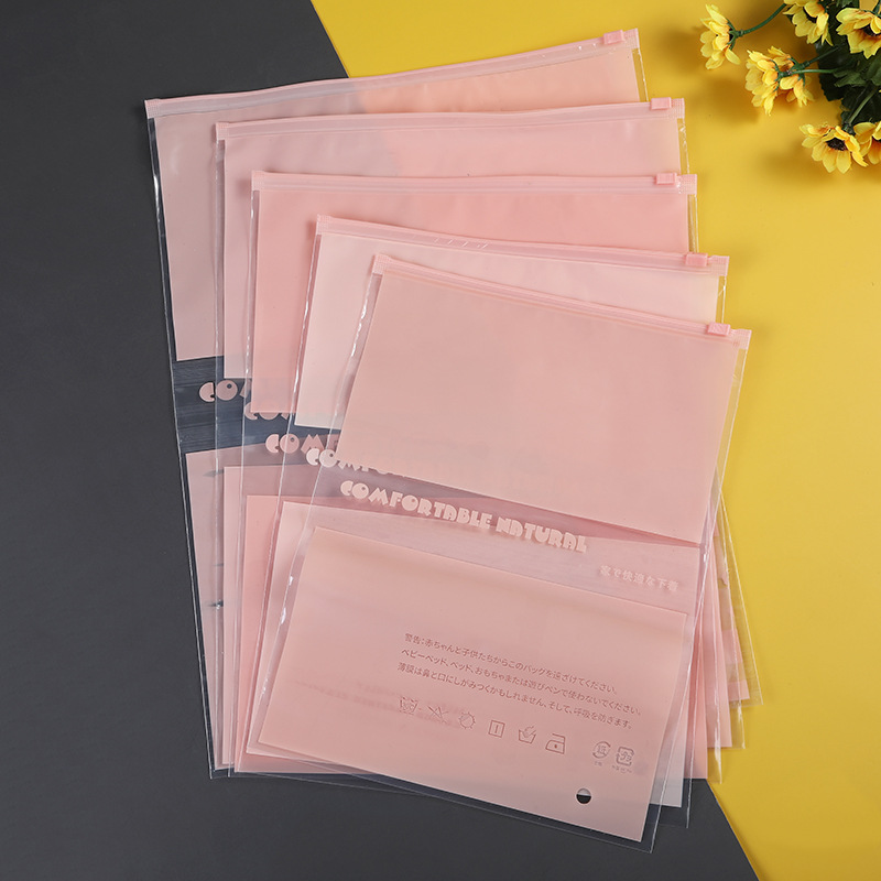 En stock 16 seda translúcido Rosa ropa japonesa embalaje bolsa ropa interior calcetines cremallera bolsa PE plástico Ziplock bolsa