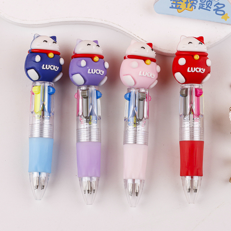 Fabricante mayorista de cuatro colores bolígrafo de silicona bolígrafo multicolor de dibujos animados cabeza portátil de estudiantes