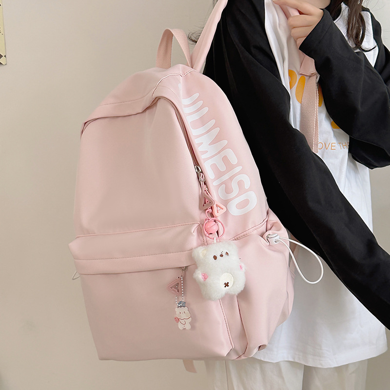 Mochila de gran capacidad para estudiantes de secundaria femenina simple y versátil para estudiantes de secundaria japonesa mochila de diseño