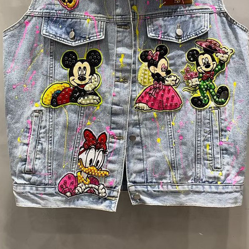 Marca de dibujos animados de marcha europea, graffiti, chaqueta de vaqueros industria pesada, chaqueta media y larga, 2026 primavera, nueva chaqueta suelta