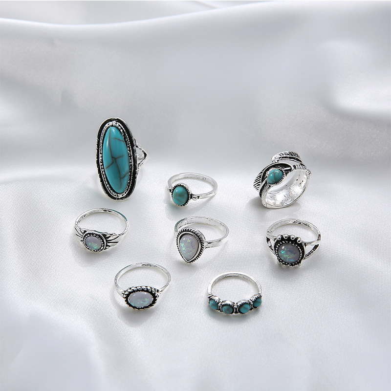 Retro Inlaid Turquoise Carved Feather Alloy Ring 8-piece Set display picture 5