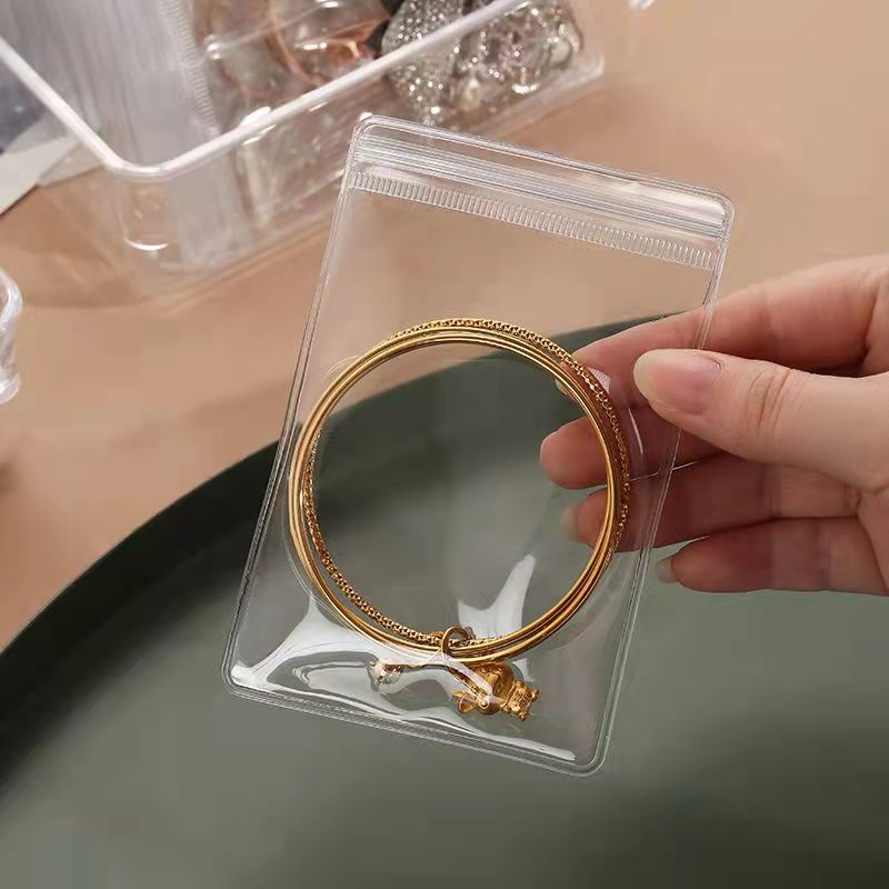 Simple Style Solid Color PVC Transparent Jewelry Packaging Bags display picture 4