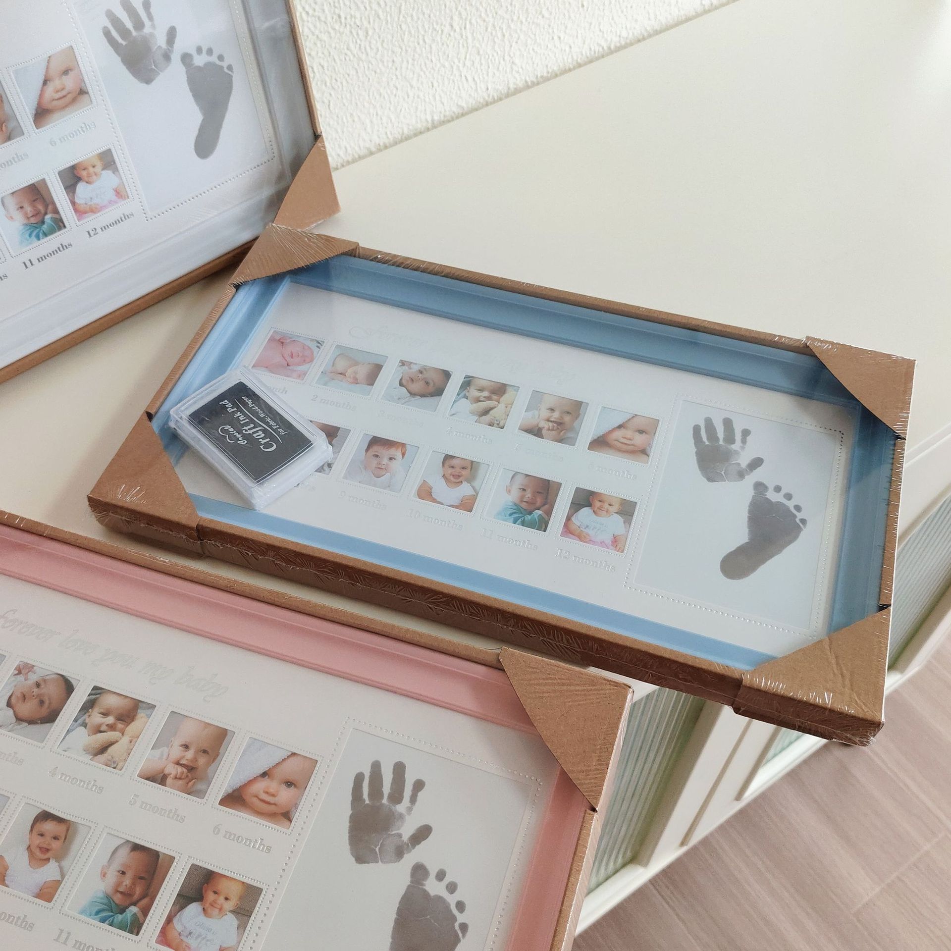INS Growth registra el aniversario del cumpleaños del bebé con huellas de manos y pies y documentos infantiles de Amazon en marcos de fotos de plástico