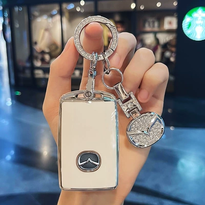 Cx5/Cx-50 All-Inclusive 1.5L/2.0L Classy — Car key bag - type-c-three-button-white-key-cover-diamond-encrusted-car-logo