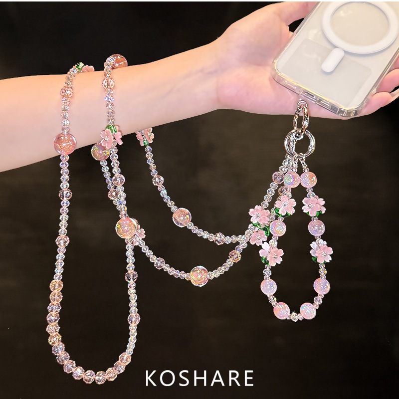 Flor de melocotón brillante cadena de teléfono móvil ligera de lujo de alto nivel colgante de cristal de moda anti-caída colgante de mano perlas para mujeres
