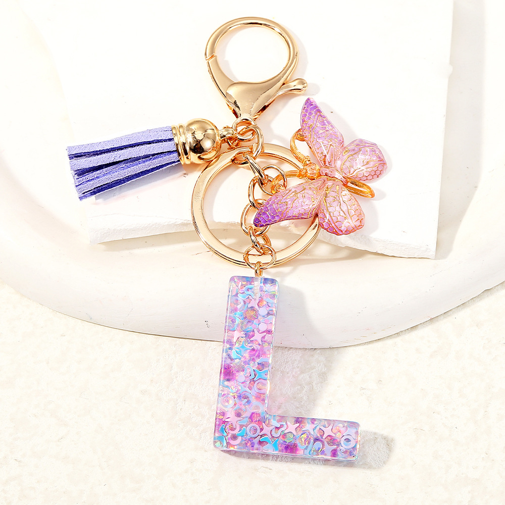 Inglés transfronterizo A-Z resina letras llavero colgante mariposa púrpura bolsos de mujer colgante llavero de automóvil