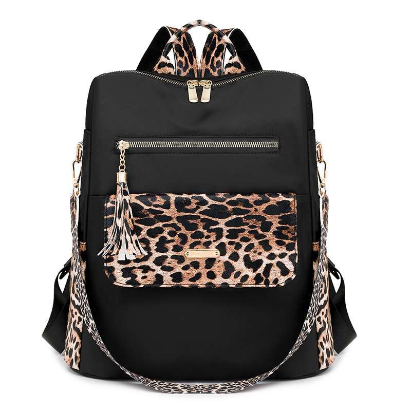 Comercio exterior nuevo estilo borla moda de gran capacidad mochila de nailon para mujer mochila de viaje ligera al aire libre simple y versátil