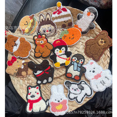漫画のタオルの刺繍の自己接着布はペンギンの犬の柿のハンバーグの熊のパッチを貼って携帯のケースの服装の包みの補助材料を貼ります。