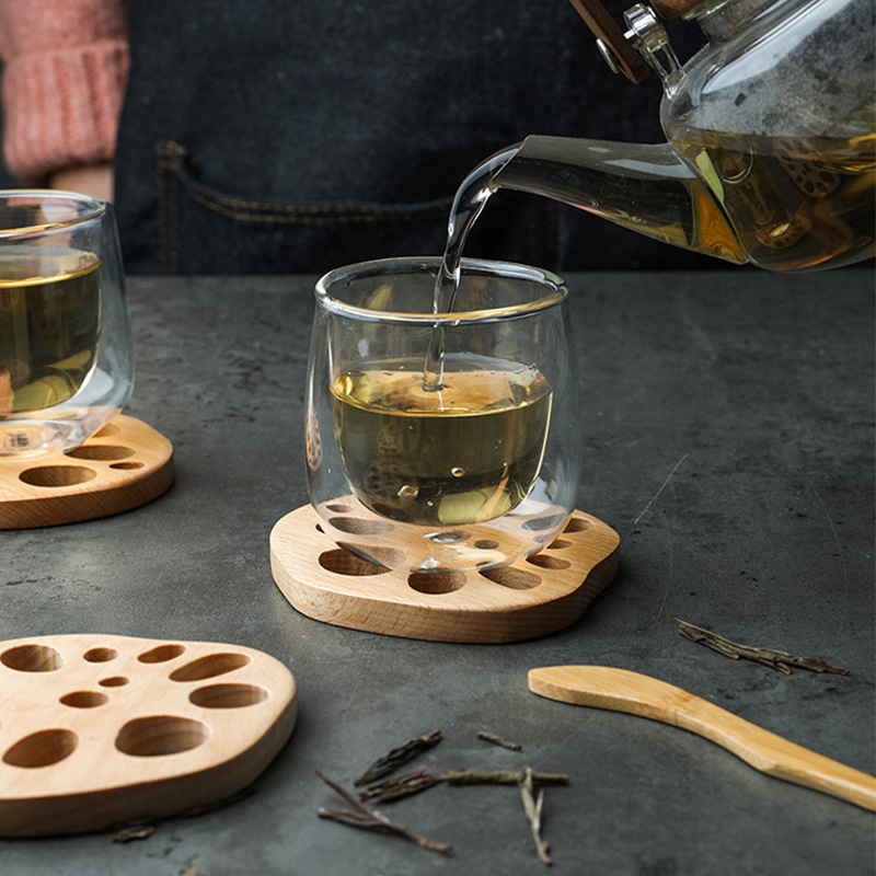 Estufa hirviendo taza de té estera taza simple taza de café taza soporte anti-escaldado aislamiento de madera de haya de madera maciza Generación de cabello creativo