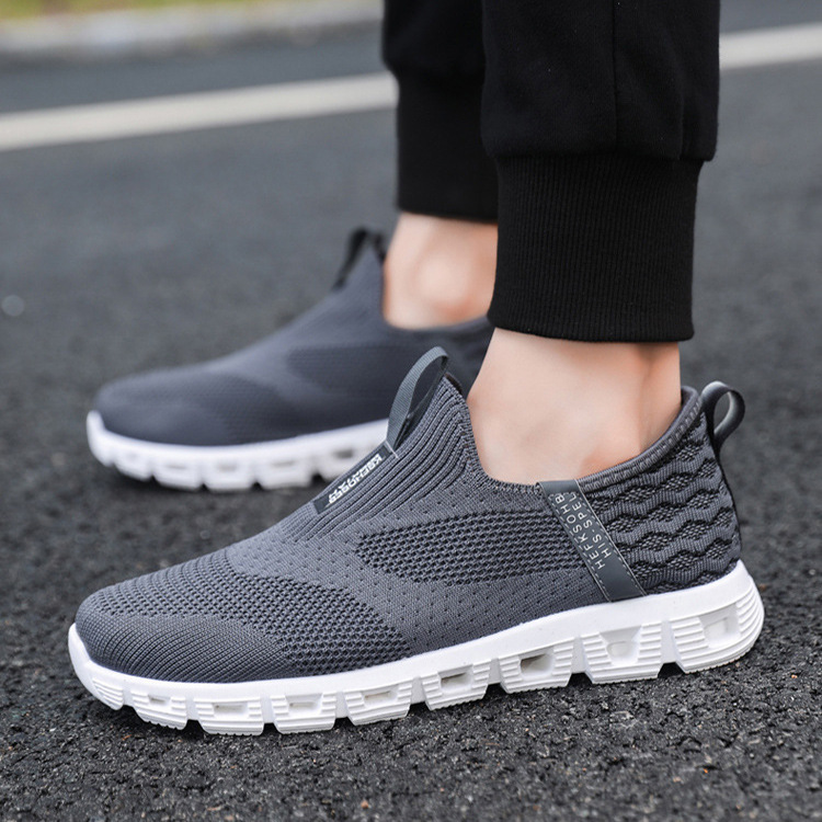 Zapatos deportivos transfronterizos de talla grande para hombre, nuevo estilo de zapatillas deportivas de punto, zapatos casuales sencillos sin cordones para hombre, zapatos ligeros para hombre