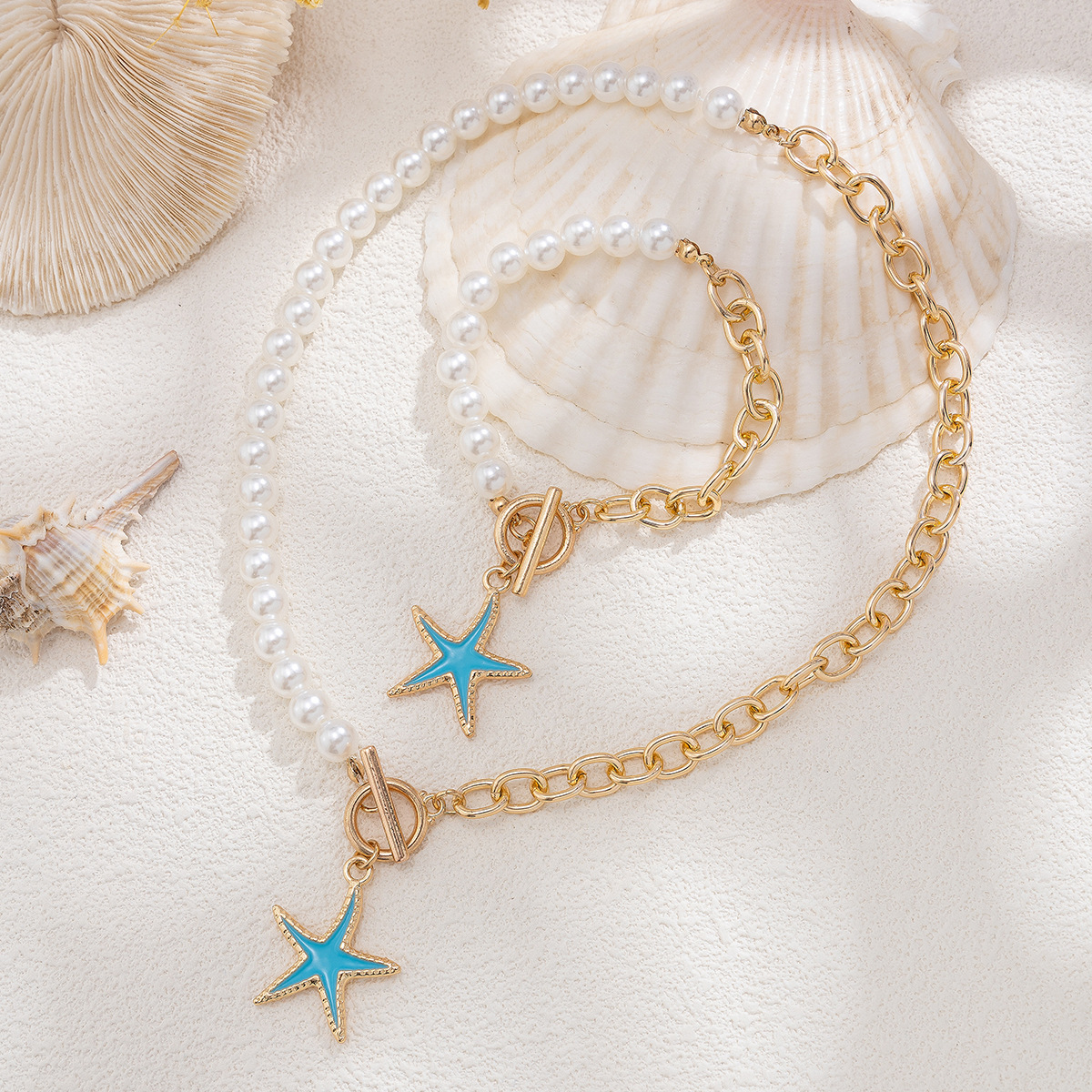 Set gioielli donna collana croce stella e perle sintetiche_voghion.com