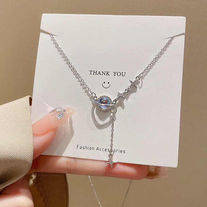 Plata Moonstone planeta collar femenino S925 plata esterlina cuatro Awn estrella colgante cadena clavícula nicho diseño sentido luz estilo de lujo