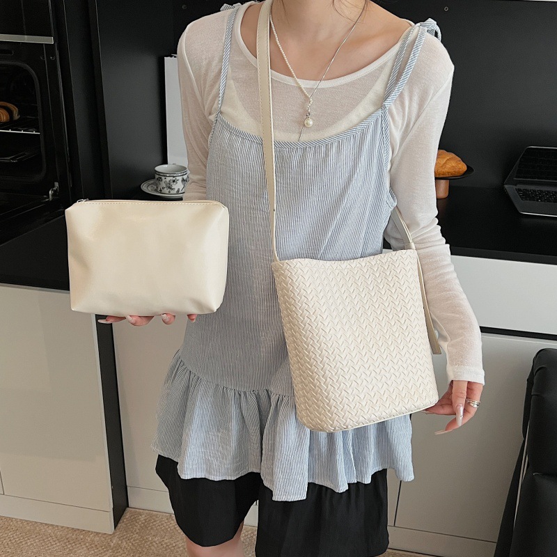 Bolso de cubo de textura transfronteriza 2025 verano nuevo bolso femenino retro tejido patrón bandolera moda niño-madre bandolera