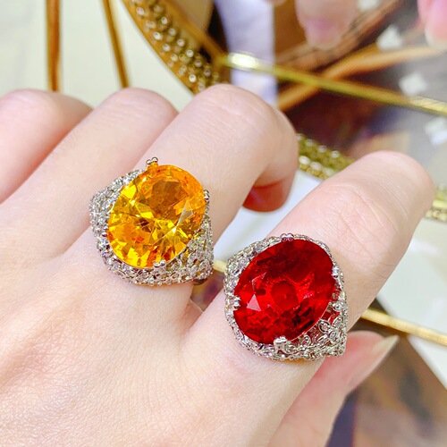 New pigeon egg red ruby ring for women, luxurious high-end net base design side full diamond colored gemstone ring