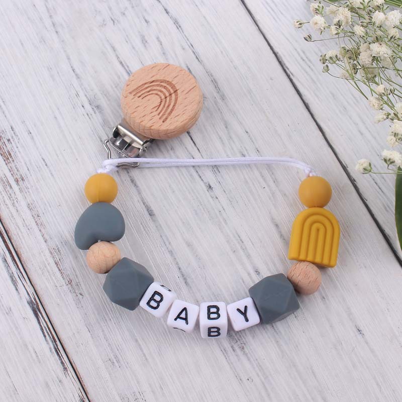 Nuevo bebé suministros de dibujos animados Arco Iris chupete clip calmante bebé Arco Iris silicona mordedura molar chupete cadena