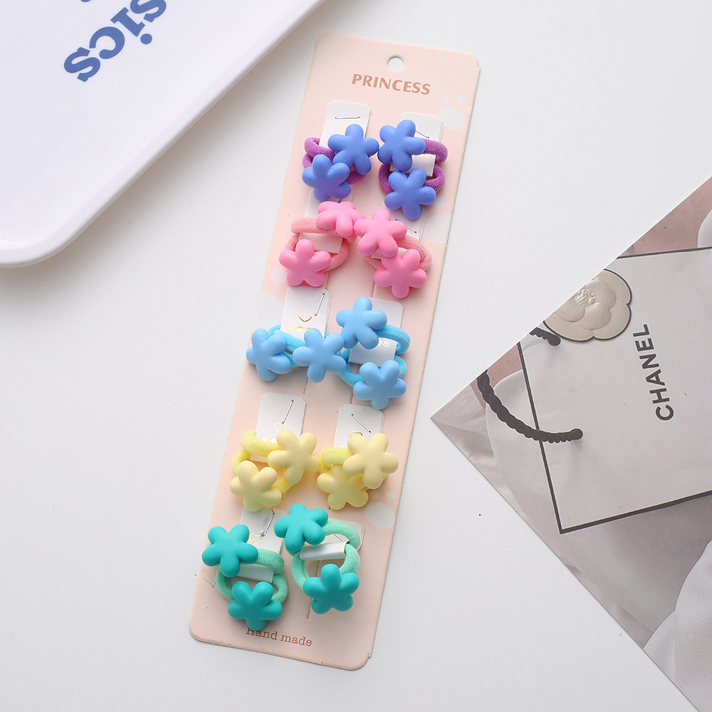 La alta elasticidad de los niños no duele la banda de goma de la cuerda del pelo del bebé de la banda linda del pelo del pulgar de la niña