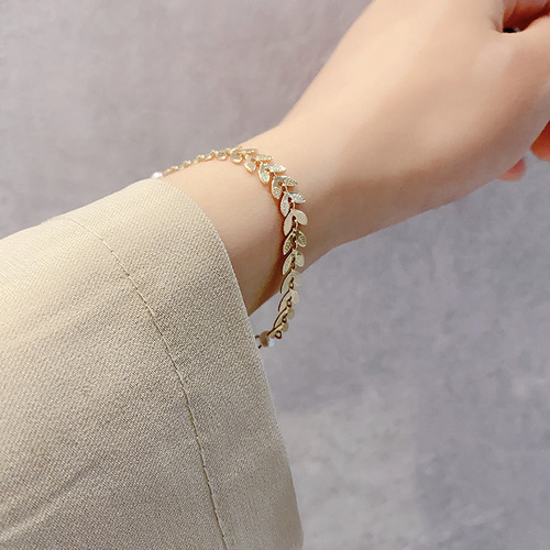 Three-piece niche design wheat ear pearl necklace, earrings, bracelet set, cold style simple internet celebrity jewelry