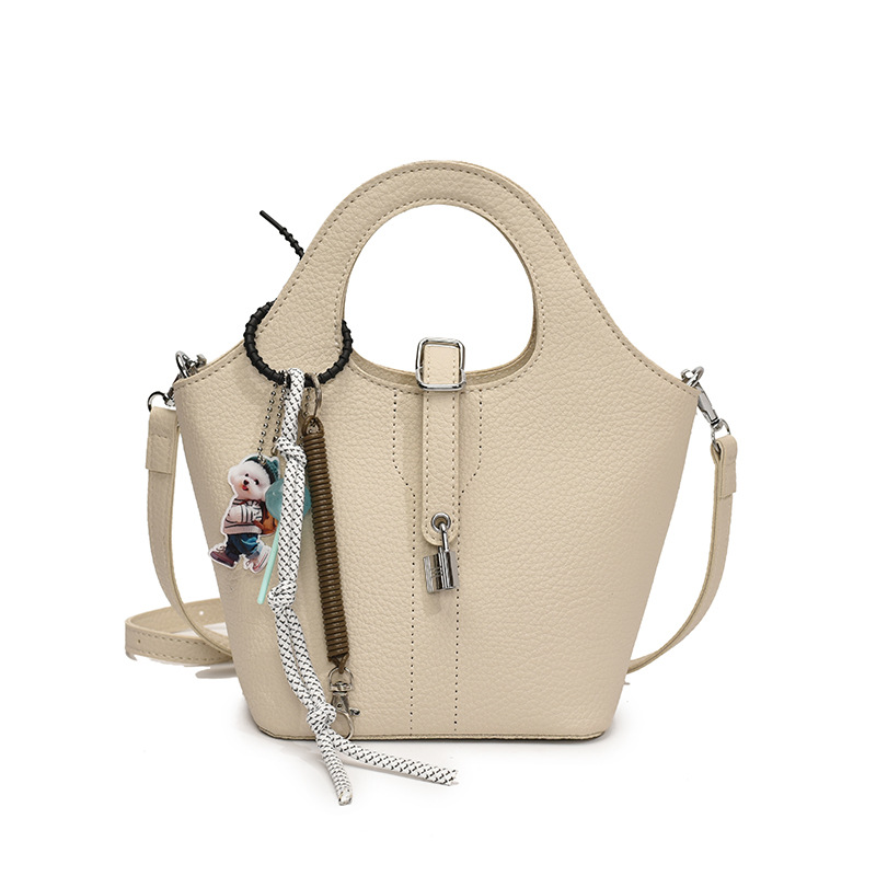 Comercio exterior explosivo bolso de cubo de mano 2025 nuevo estilo de moda universal bolso de hombro de nicho diseño de alta sensación bolso de mochila