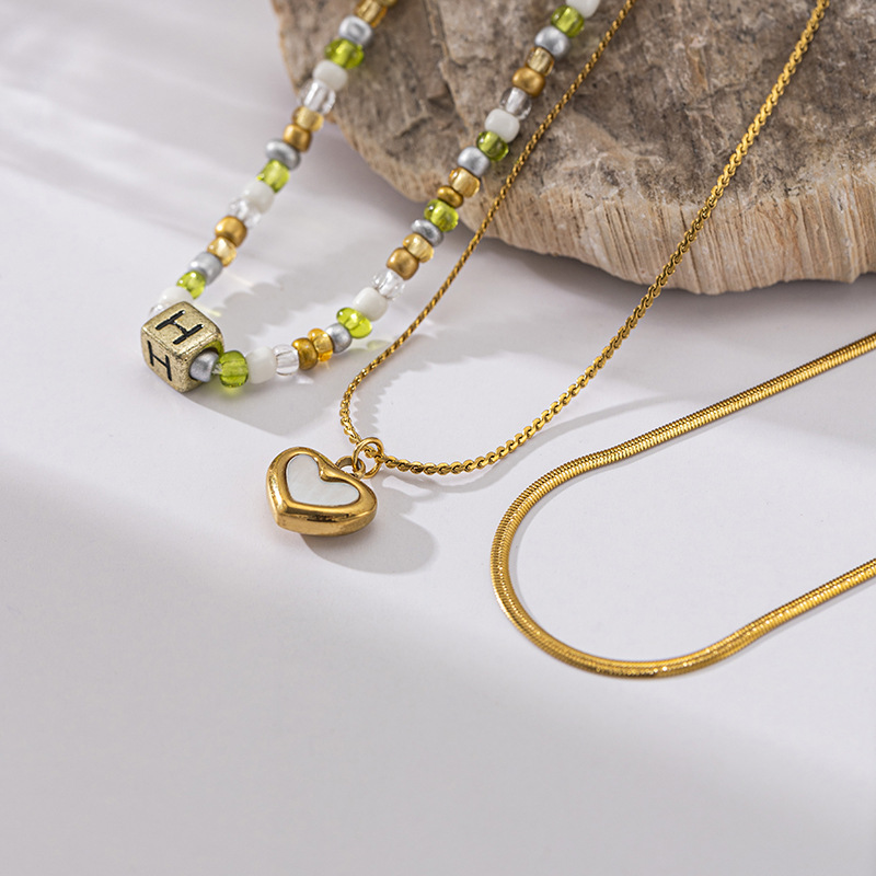TENA Europa y los Estados Unidos original nicho de diseño amor conchas de arroz cuentas puro collar de acero inoxidable conjunto de collares