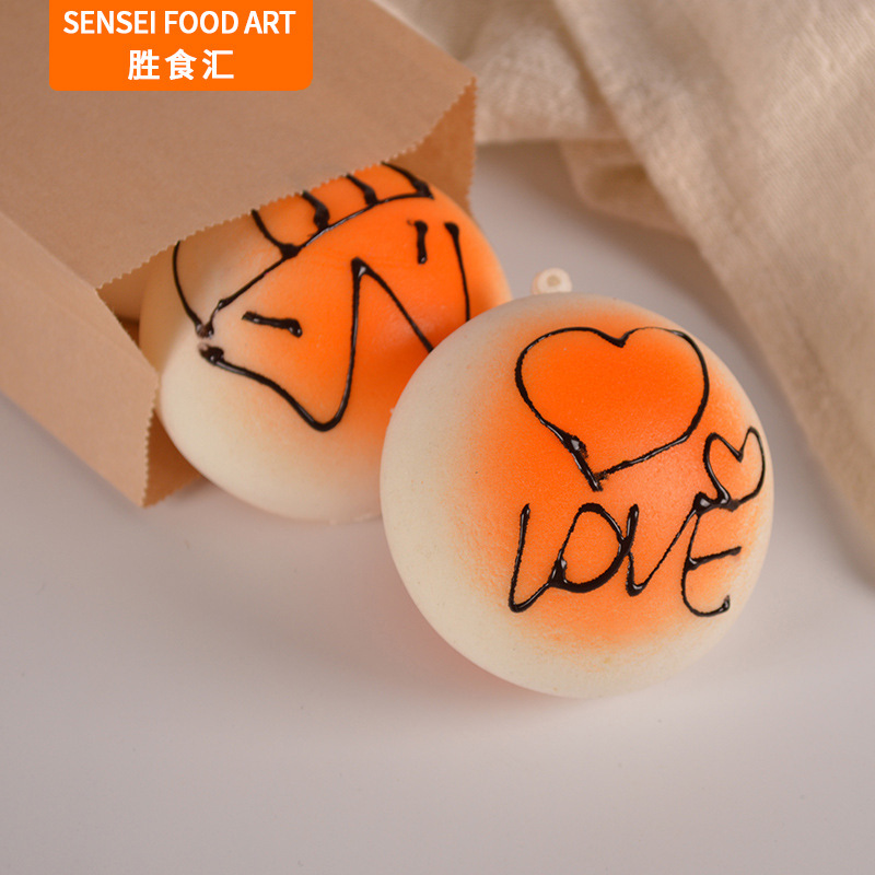 Factory direct Pu slow rebound hand-painted simulation smiley face bread key chain bag pendant pendant travel souvenir