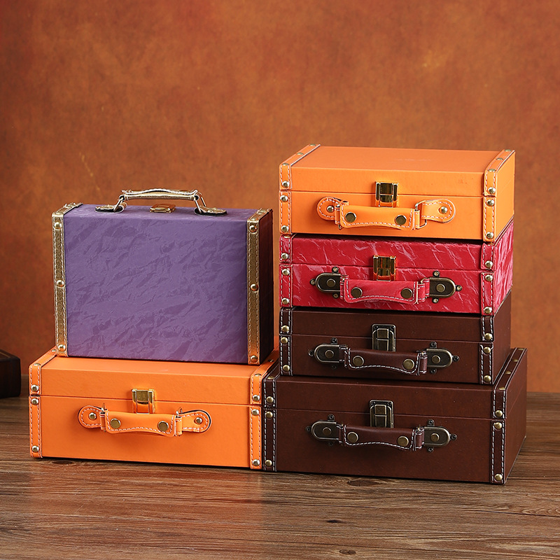 Handheld capacious storage box for traveling