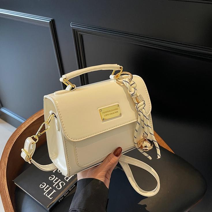 Simple y popular bolso de mano 2025 nuevo estilo de moda retro bolso de hombro coreano alta sensación mochila de mujer