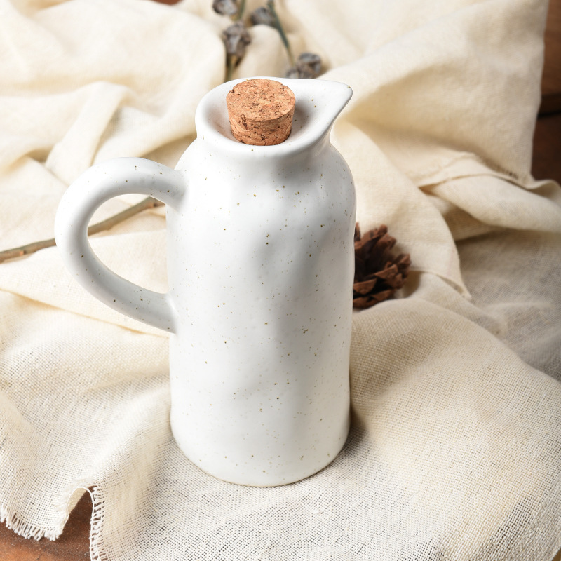 Olla de aceite de cocina transfronteriza personalizada sin aceite colgante, olla de vinagre de salsa para el hogar, botella de condimento de cerámica de textura de pellizco creativo a mano comercial