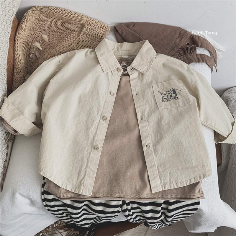 Nuevo estilo japonés y coreano de ropa infantil para hombres y mujeres bebés camisa versátil primavera y otoño ropa infantil base de dibujos animados con solapa camisa de manga larga