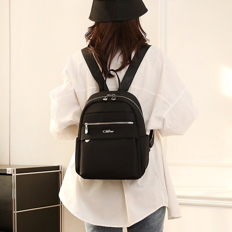 Mochila tendencia transfronteriza 2024 primavera nueva mochila para mujer bolsa de viaje informal mochila escolar para estudiantes bolsa de tela de nailon