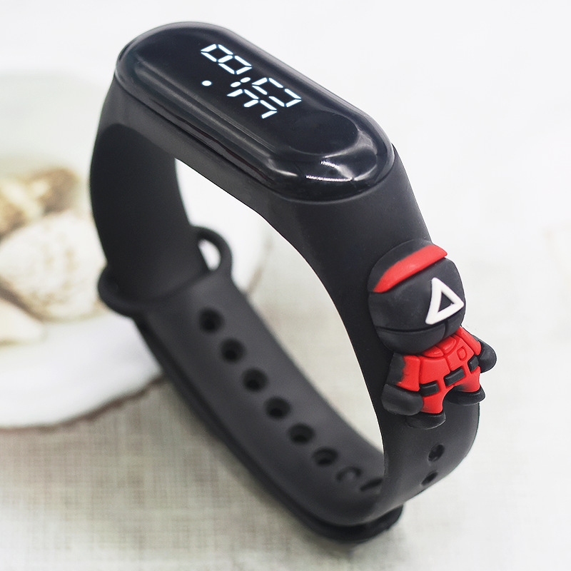 Nuevo LED M 3 medio cuerpo muñeca de dibujos animados Correa reloj electrónico creativo estudiante plástico impermeable pulsera reloj de los niños