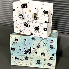 赤い本の同じタイプの月の子猫の贈り物の袋の高い顔の値のプレゼントの袋の大容量の白い紙のかわいいプレゼントの紙袋
